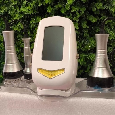 Dispositivo de emagrecimento com tela e aplicadores metálicos em suporte transparente