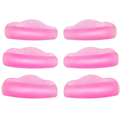 Seis almofadas rosas de silicone com marca OKO sobre fundo branco