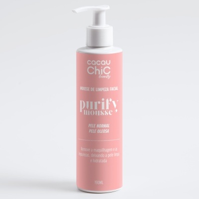 Frasco rosa de mousse de limpeza facial com doseador branco