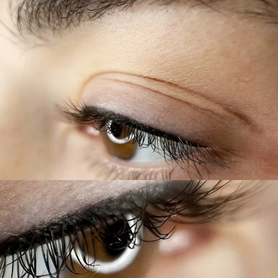 Close-up de olho castanho com pestanas e delineador negro