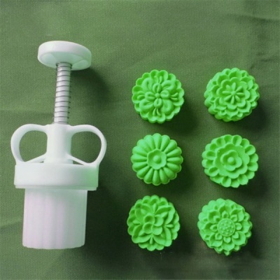 Conjunto marcador prensador branco com seis moldes verdes florais