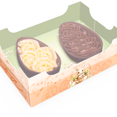 Dois ovos de chocolate em caixa decorativa creme e verde claro