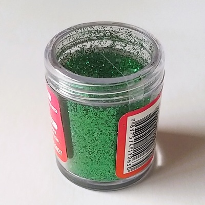 Frasco pequeno com purpurina verde