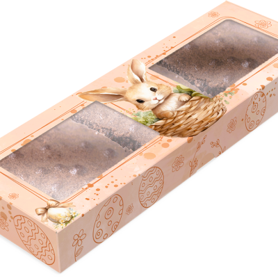 Embalagem de cartão rosa claro com duas janelas transparentes e coelho decorativo contendo bolos ou pães de côco