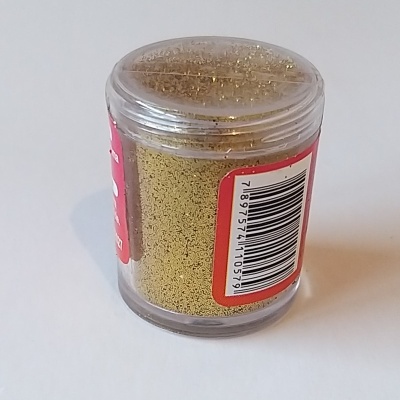 Frasco pequeno transparente com glitter amarelo dourado e rótulo vermelho