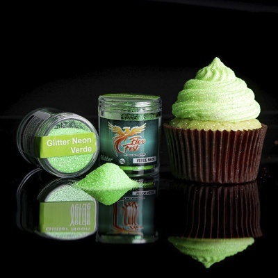 Frascos de glitter verde neon e cupcake com cobertura verde brilhante