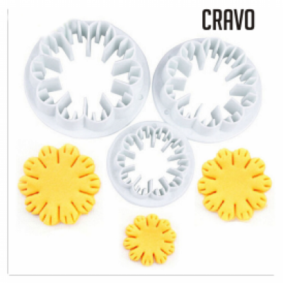 Conjunto de cortadores de massa em plástico com formato de flor e estampas de massa amarela