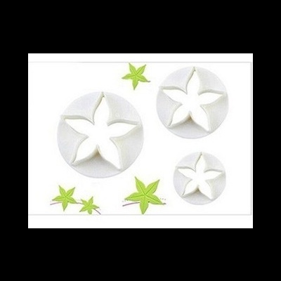 Conjunto de cortadores de massa formato folha em plástico branco com ilustrações verdes