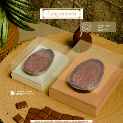 Ovos de chocolate em embalagens claras sobre mesa com plantas e chocolates ao redor