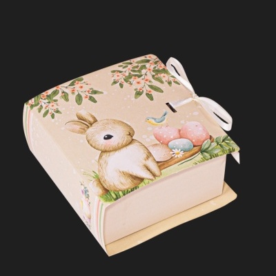 Caixa de papel com ilustração de coelho e decoração primaveril