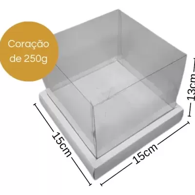 Caixa transparente em plástico com base branca quadrada e etiqueta em círculo dourado