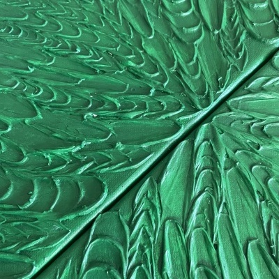 tecido verde texturizado com padrão em relevo