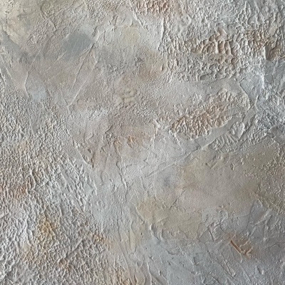 Superfície texturada bege com padrões irregulares e relevos