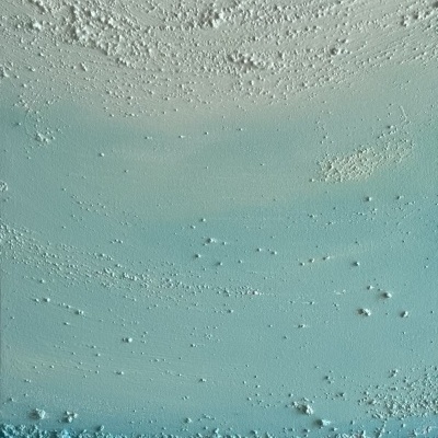 Superfície com textura granulosa em tons de azul e branco