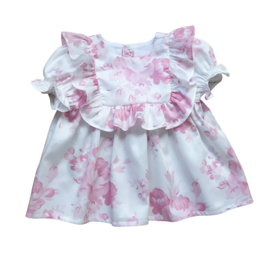 Vestido bebé branco com flores rosas e folhos