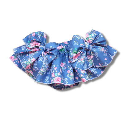 Saia curta azul floral com grandes laços laterais