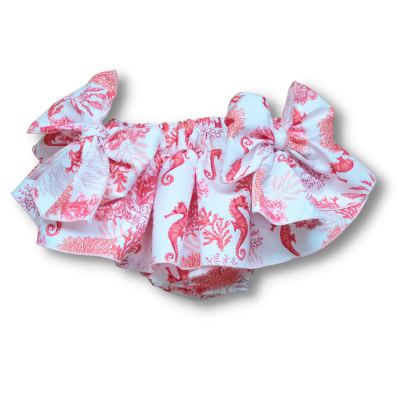 Roupa de bebé com laços e estampado coral vermelho