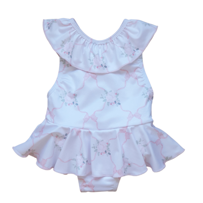 Fato de banho branco de criança com padrão floral e folhos