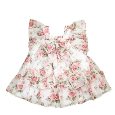 Vestido infantil branco com padrão floral rosa e verde e laço frontal