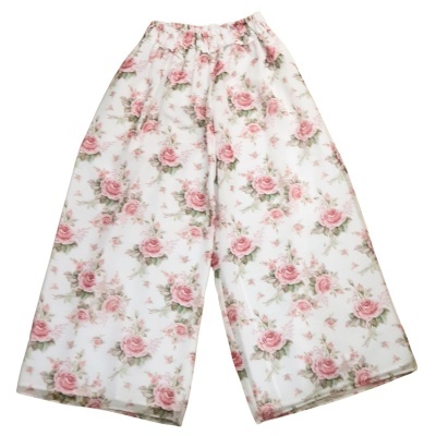 Calças largas transparentes com padrão de flores rosas