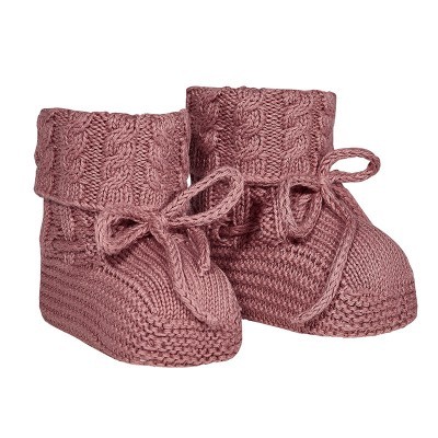 Botas bebé em malha rosa com laço e padrão de trança.