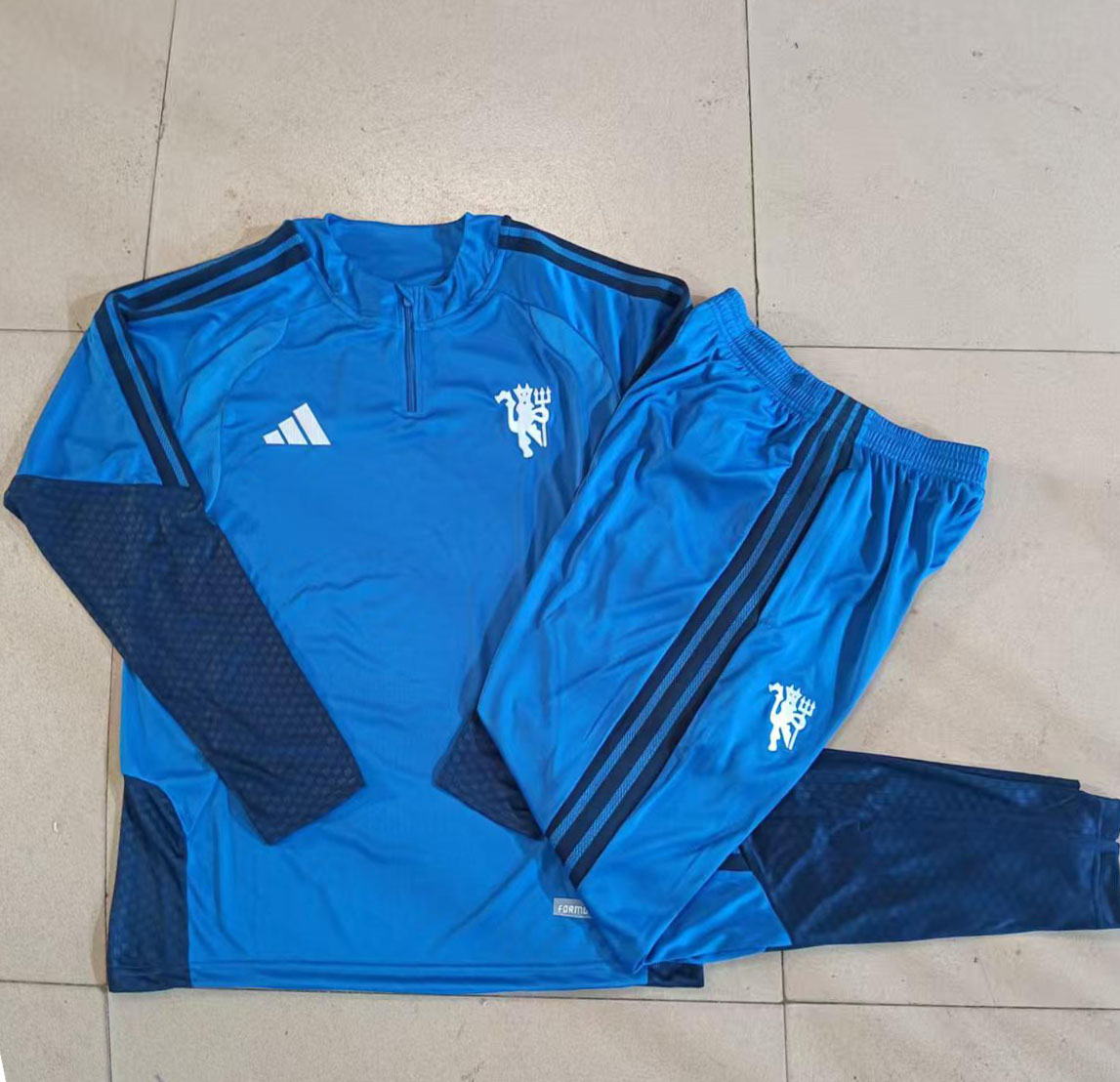 Fato de Treino Manchester United 2026/27 Azul &mdash; Modelo &Uacute;nico