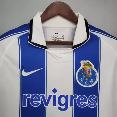 Camisola de futebol FC Porto azul e branca com logo Nike e patrocínio Revigres
