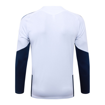 Camisola desportiva branca e azul escuro vista de trás