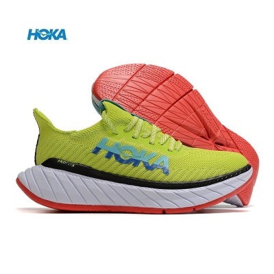 Ténis de corrida HOKA amarelo com sola vermelha e logótipo azul
