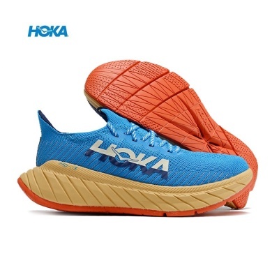 Tênis de corrida HOKA azul com sola beije e laranja