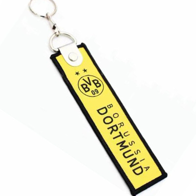 Chaveiro amarelo e preto com texto Borussia Dortmund e logo BVB 09