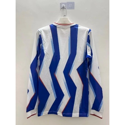 Camisola de manga comprida com padrão geométrico azul e branco