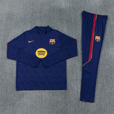 Conjunto treino FC Barcelona azul com logótipos Nike e Spotify