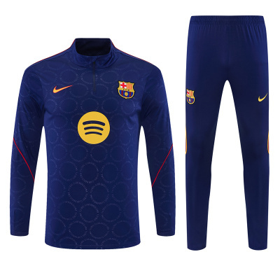 Conjunto desportivo azul escuro FC Barcelona com logótipos Nike e Spotify
