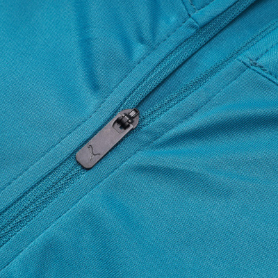 Fecho éclair preto com logo Puma em tecido azul turquesa