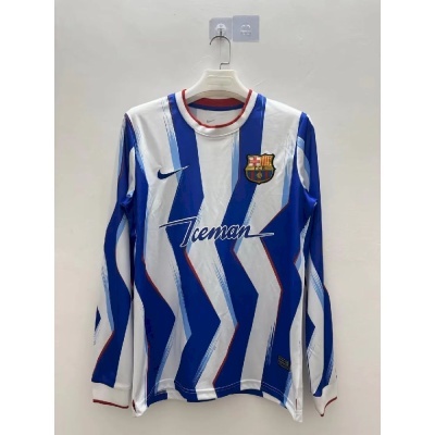 Camisola de futebol azul e branca com texto Iceman e emblema do FC Barcelona