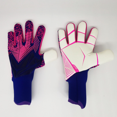 Luvas de guarda-redes de futebol azul, rosa e branco com padrão texturizado sobre fundo branco