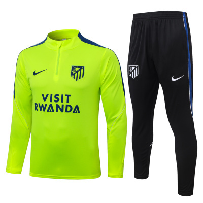 Conjunto desportivo amarelo fluorescente e preto com logos Nike e Atlético de Madrid