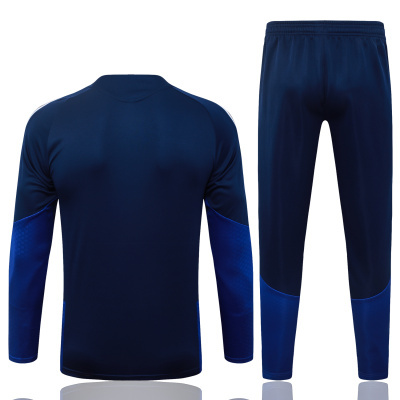 Conjunto azul escuro de calças e camisa de desporto com mangas longas