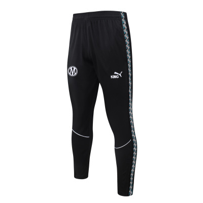 Calças desportivas pretas com estampado lateral geométrico e logo Puma KING