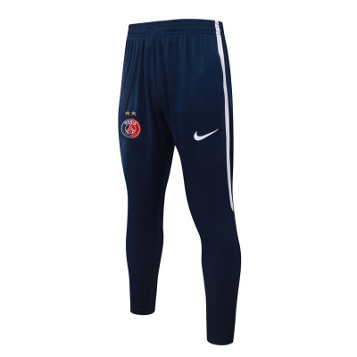 Calças de treino azul-escuro com logo do Paris Saint-Germain e Nike.
