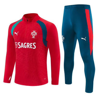 Conjunto de treino vermelho e azul com logos PUMA e SAGRES