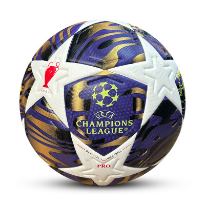 Bola de futebol oficial UEFA Champions League azul, dourada e branca com estrelas.