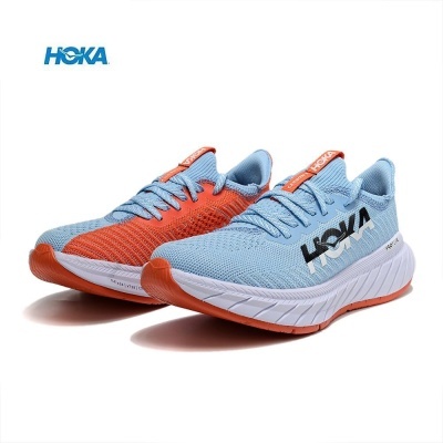 Sapatilhas de corrida HOKA azul clara e laranja com sola branca
