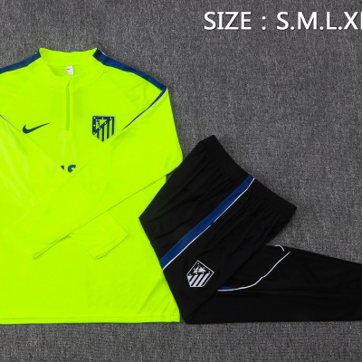 Conjunto desportivo amarelo fluorescente com calças pretas Atlético de Madrid