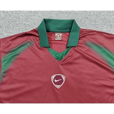 Camisola desportiva vinho e verde com logo Nike