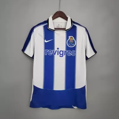 Camisola de futebol azul e branca com riscas verticais e logótipos FC Porto e Nike