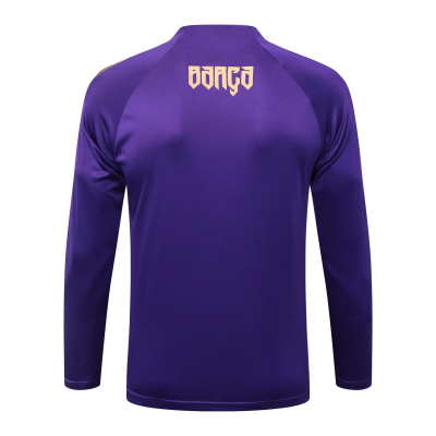 T-shirt desportiva de manga comprida roxa com palavra BARÇA nas costas