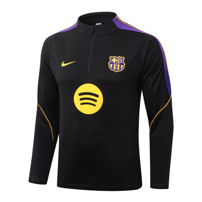 Camisola preta de manga comprida com logótipos do Barça, Nike e Spotify em amarelo