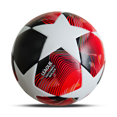 Bola de futebol com padrão de estrelas e texto LÉAGUE MATCHBALL REPLICA